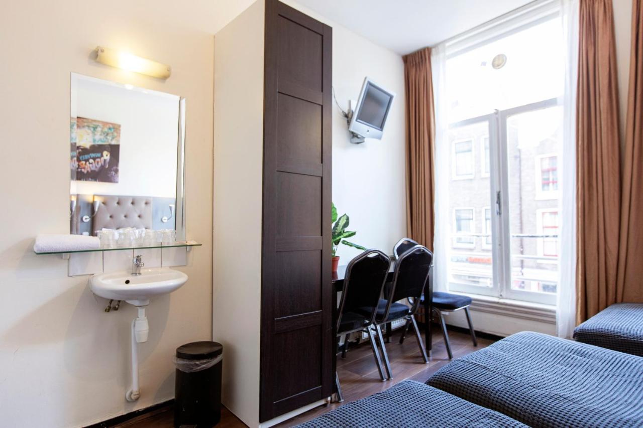 Chambre Quadruple avec Salle de Bains Commune