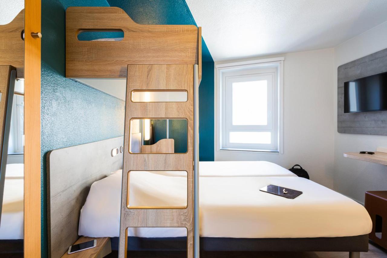 Chambre Triple avec 2 Lits Simples et 1 Lit Superposé