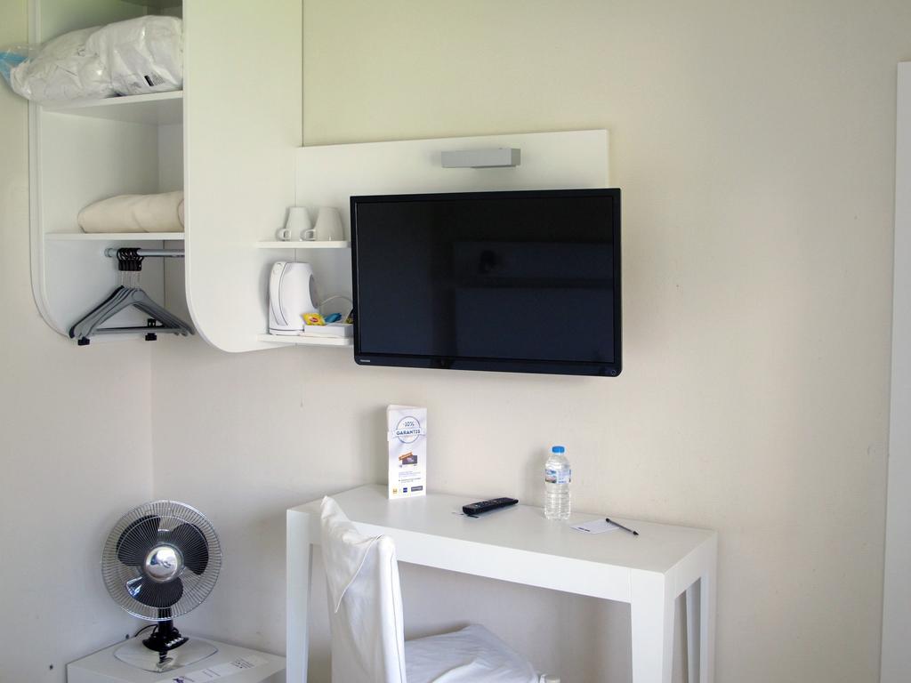 Chambre Triple (1 Lit Double et 1 Lit Simple)