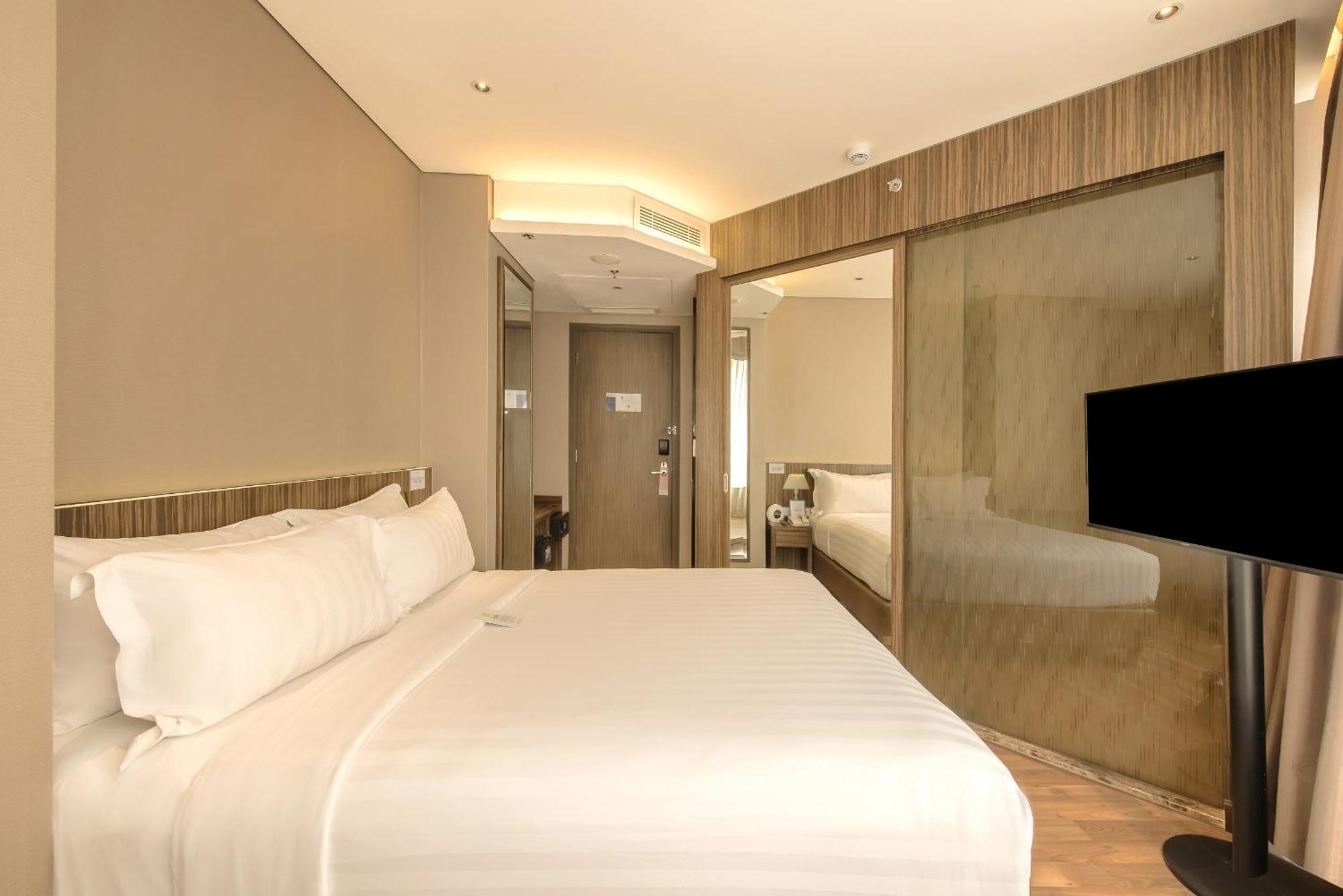 Chambre Lit Queen-Size Deluxe