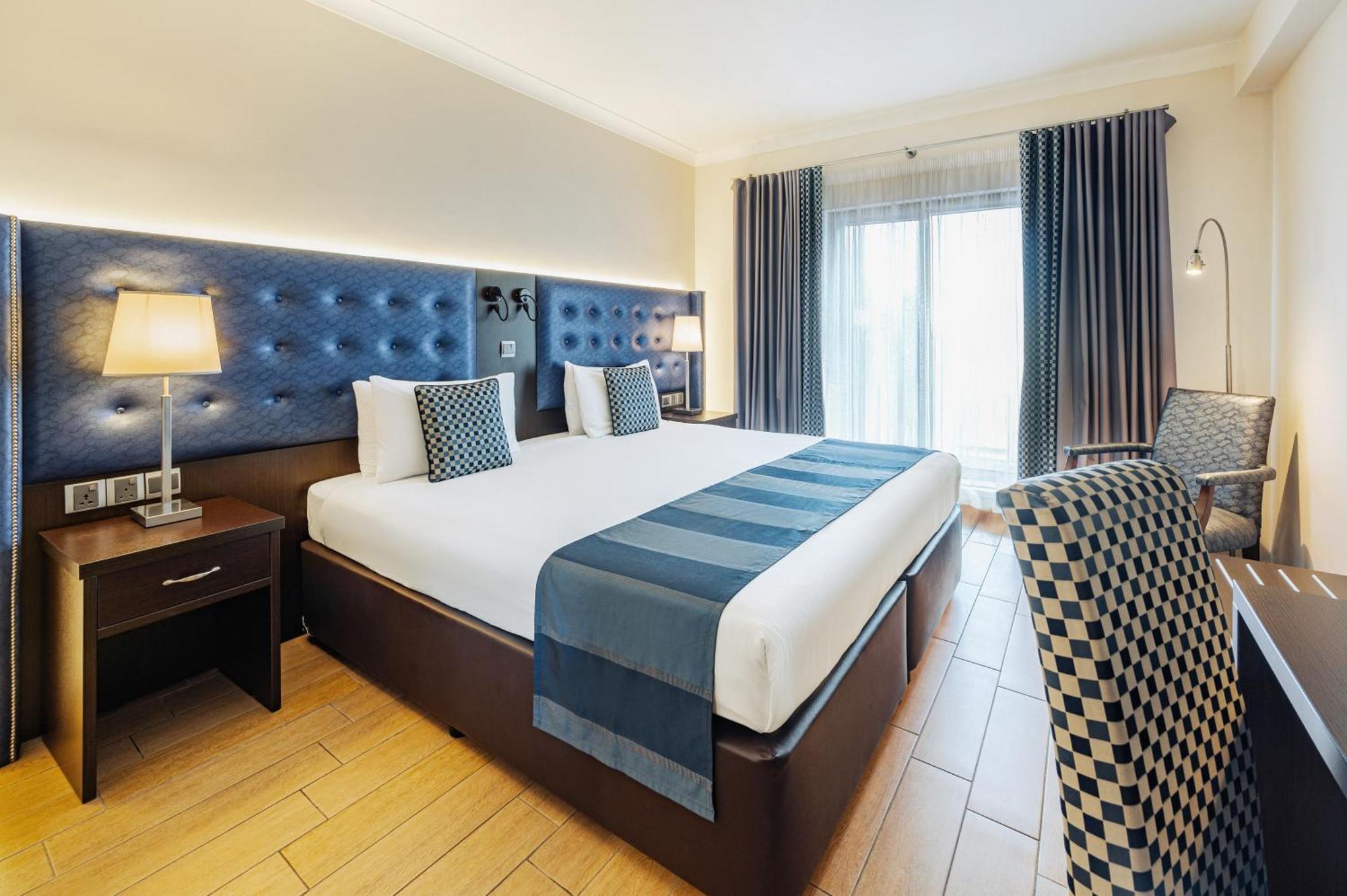 Chambre Double ou Lits Jumeaux - Vue Partielle sur Mer