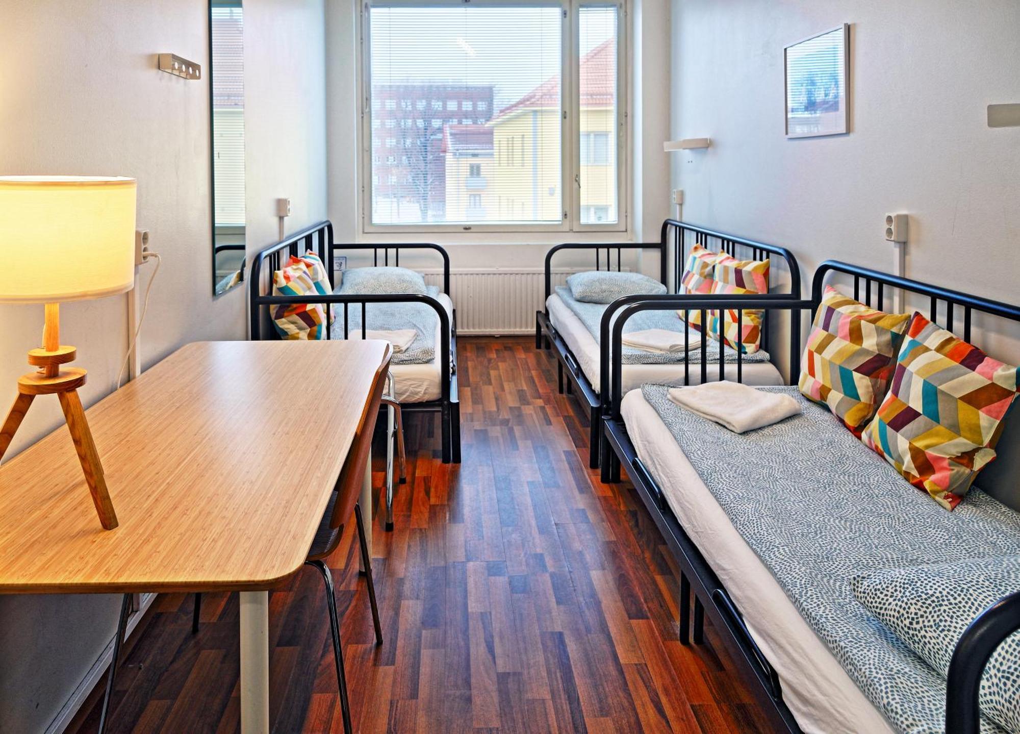 Chambre Triple avec Salle de Bains Commune