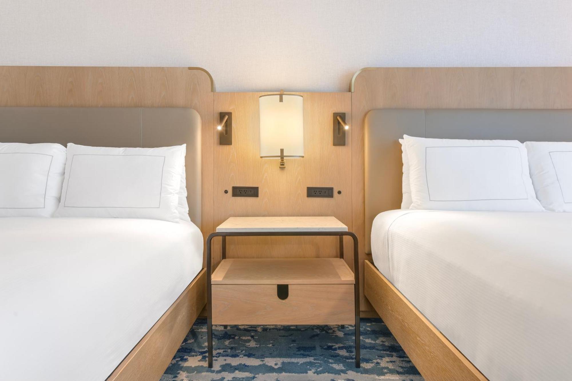 Queen Room Two Queen Beds Pool View Roll Shower Mobility Accessible