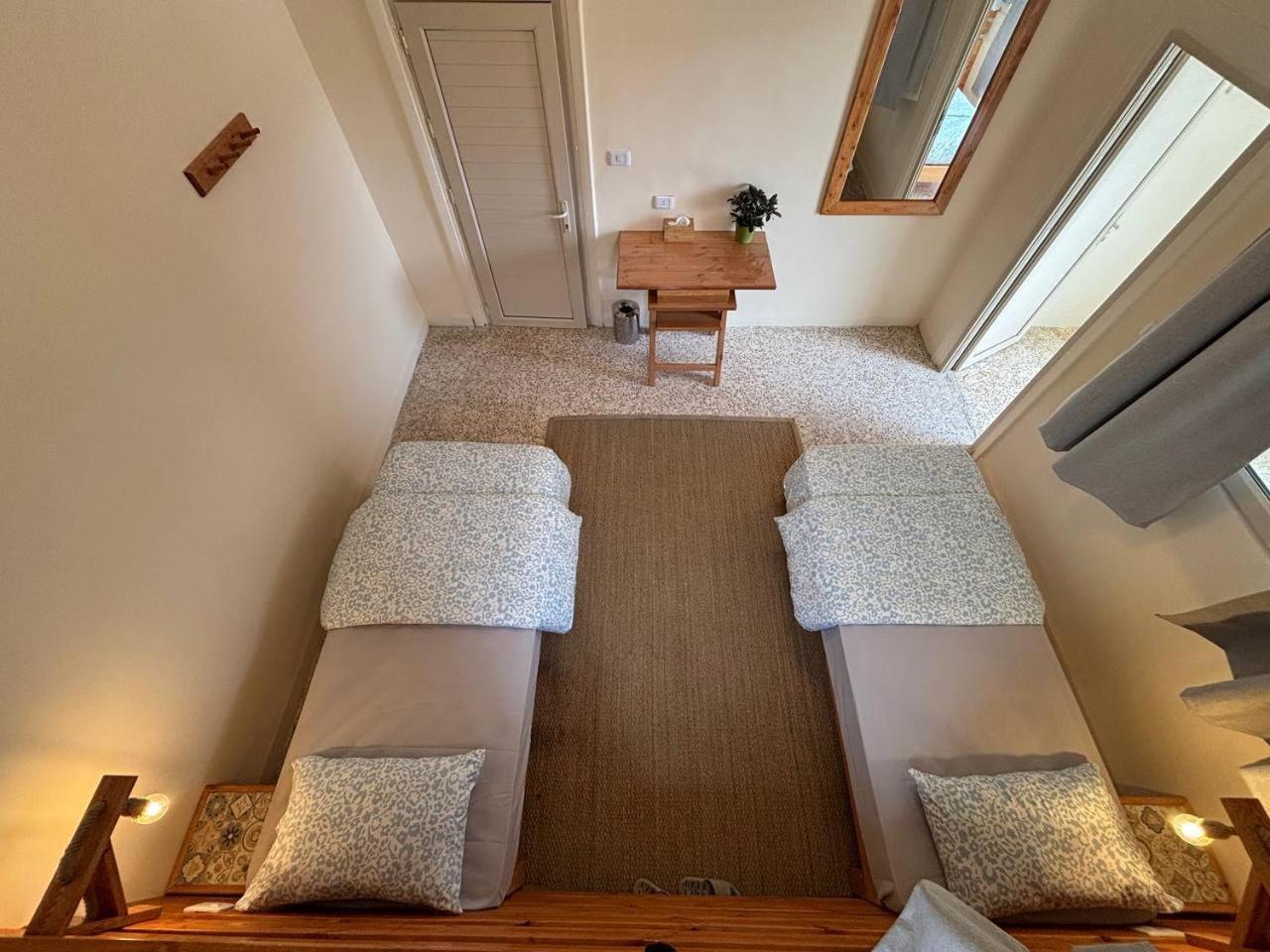Chambre Triple avec Toilettes Communes