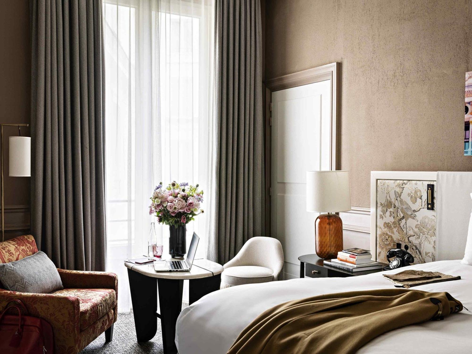 Premium Luxury Queen Room One Queen Bed Courtyard or Rue Scribe View