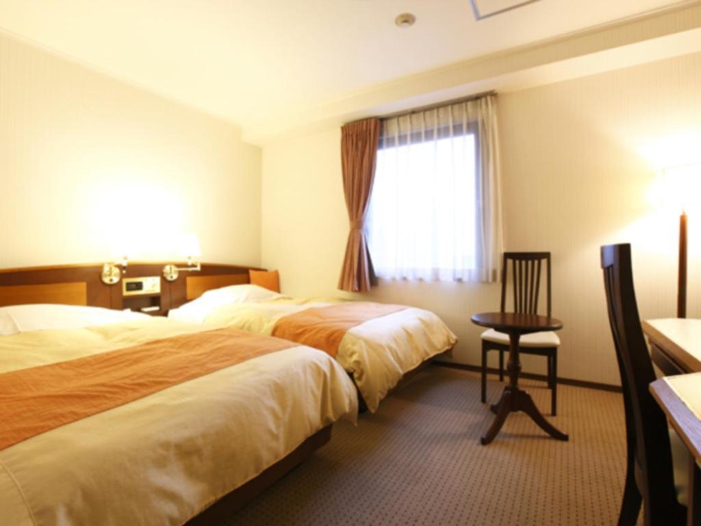 Chambre Lits Jumeaux Standard - Fumeurs