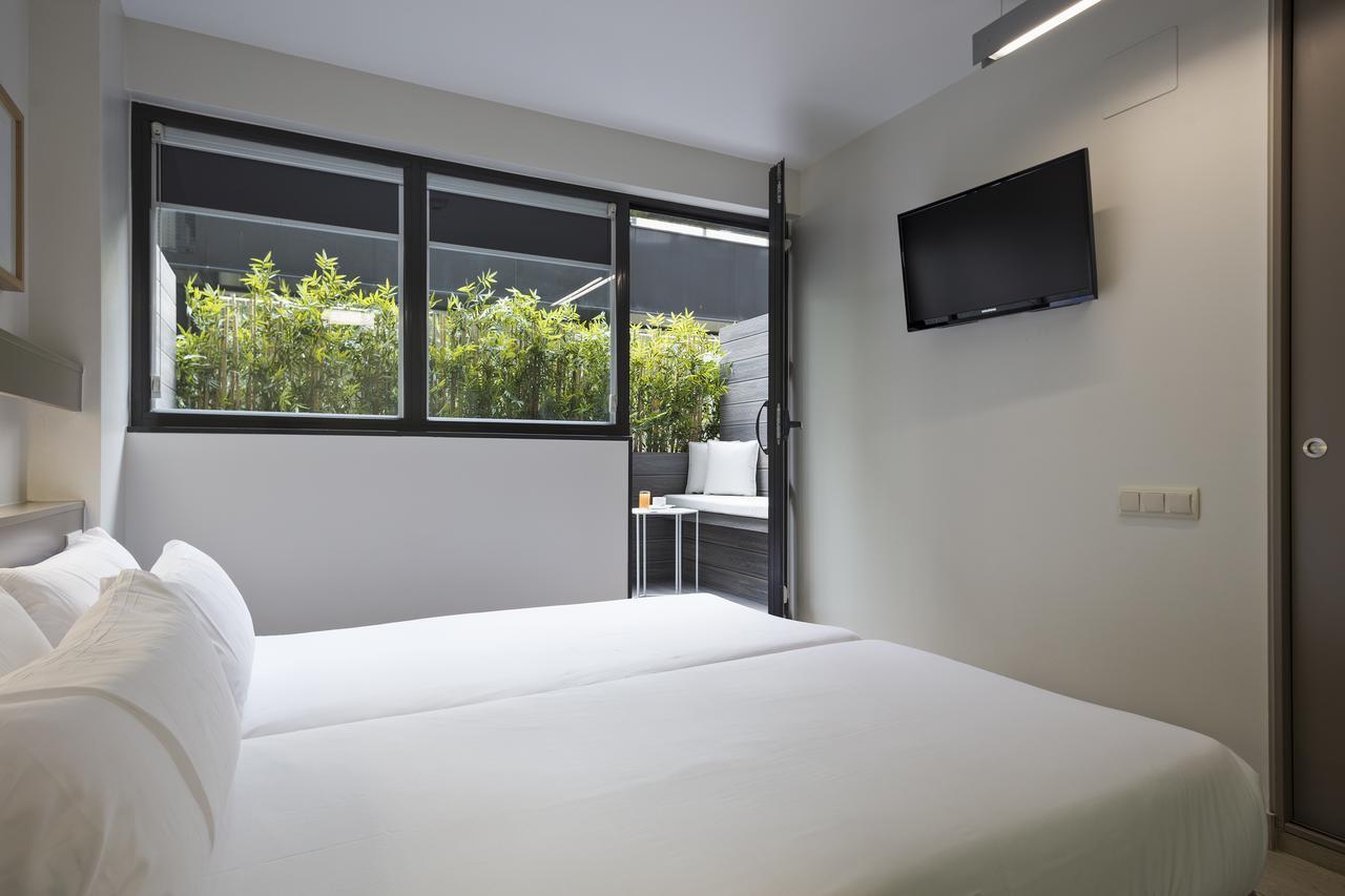 Chambre Triple avec Terrasse