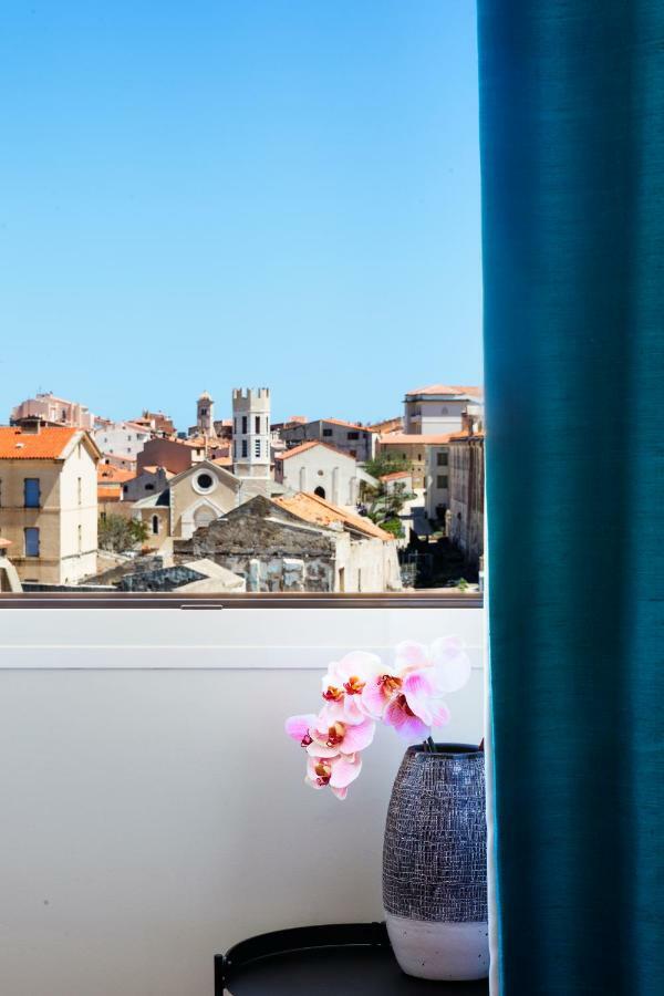 Junior Suite Balcony View of the Upper Town the Cliffs the Sea