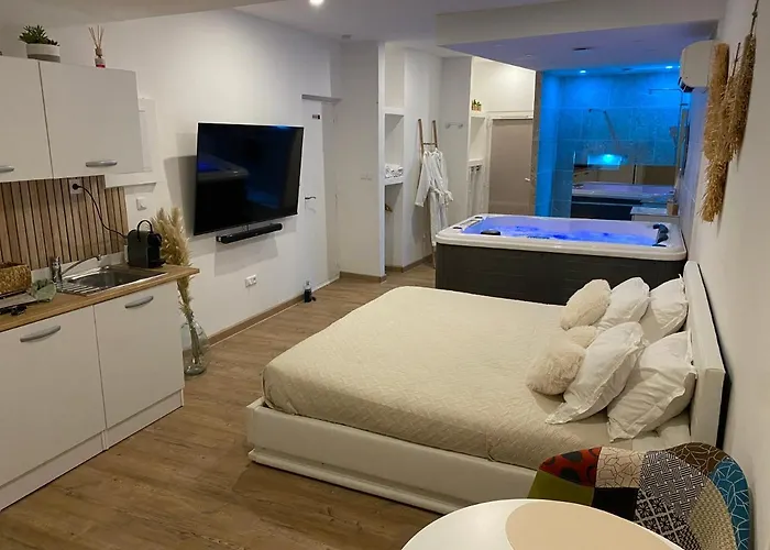 Superbe suite avec jacuzzi patio et sauna